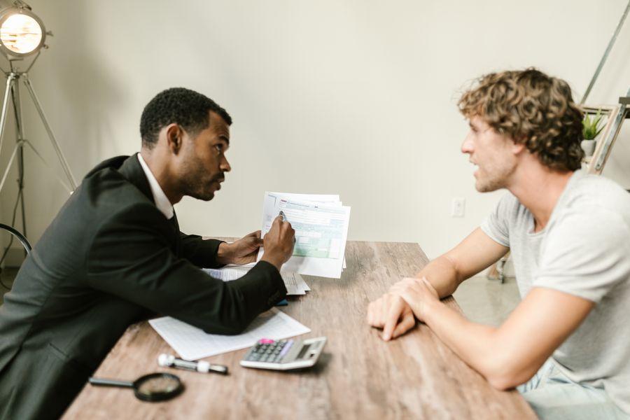 Advisor reviewing planning documents with a client